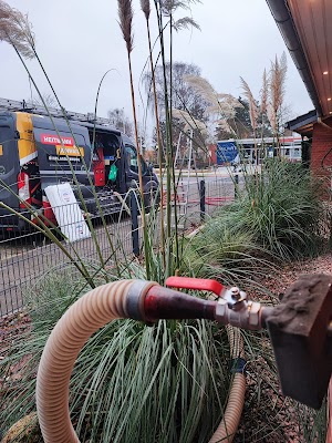 a hose attached to a metal pole