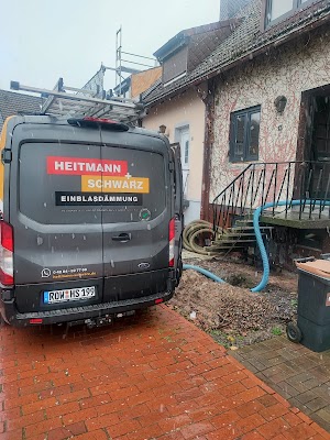 a van parked in front of a house